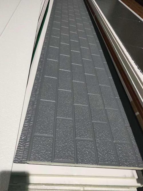 金屬雕花板外墻保溫裝飾一體板在輕鋼建筑中的應用